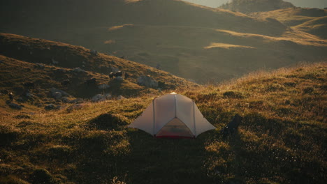 camping in the mountains at sunrise