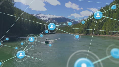 Animation-of-network-of-connections-with-icons-over-landscape