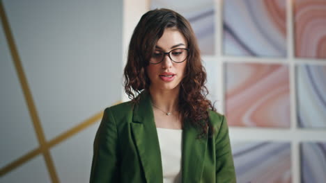 nervous manager throwing papers at business conference in modern office close up