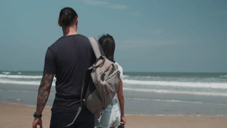 couple walking on the beach