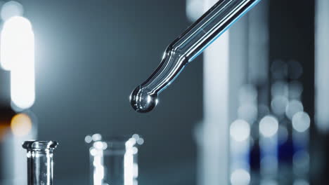 droplet from pipette in laboratory setting