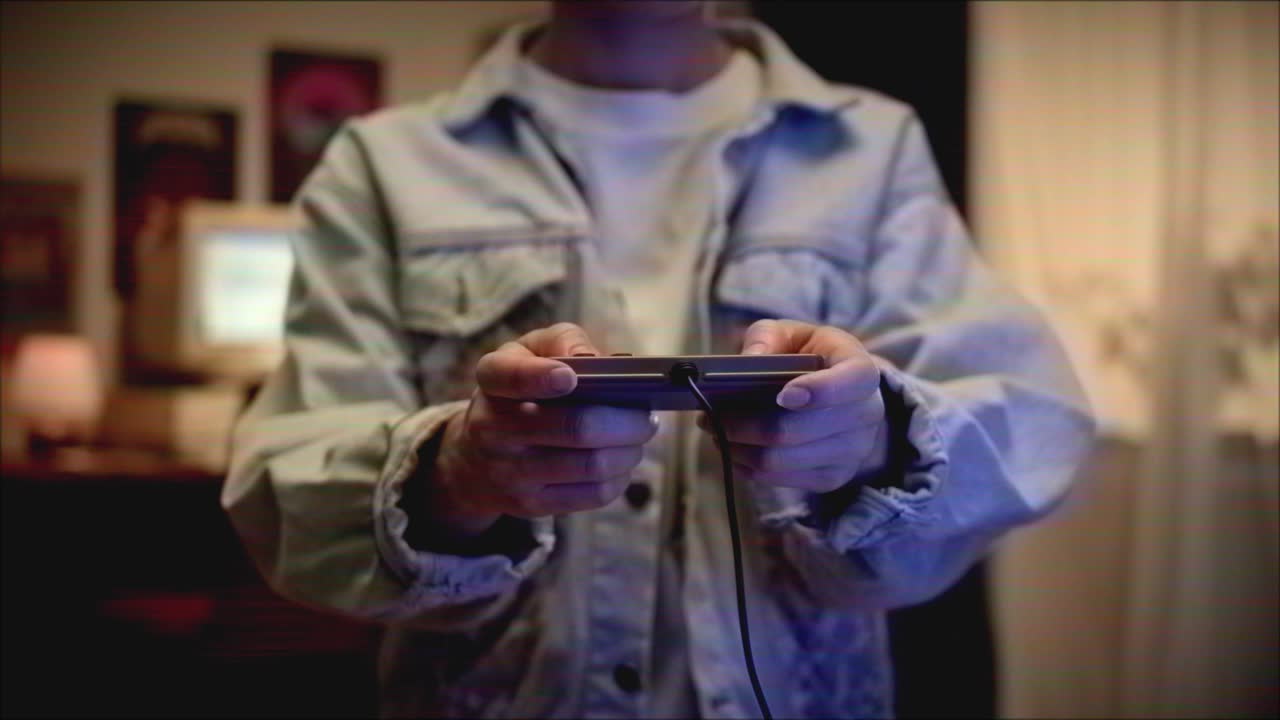Child Playing a Retro Video Game