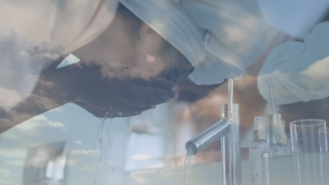 아프리카계 미국인 여성이 구름 위에서 얼굴을  ⁇ 는 애니메이션