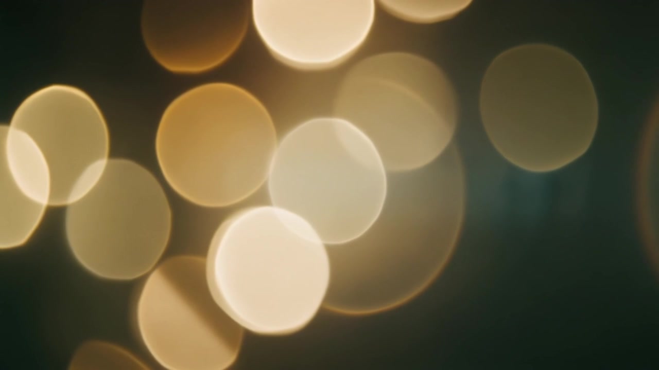 Sfondo astratto di luci bokeh dorate e soffuse