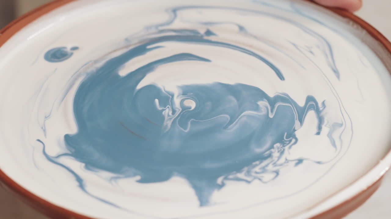 Handmade Ceramic Plates with Blue Swirl Design