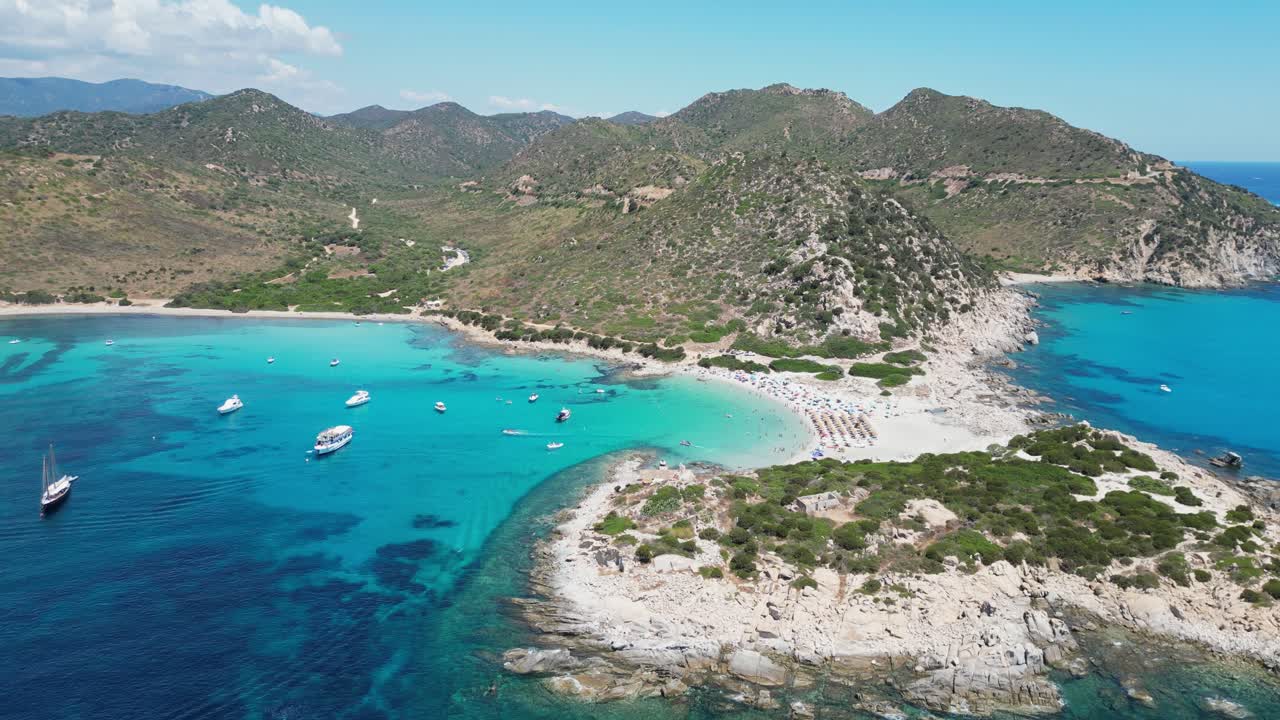 Punta Molentis Beach in Villasimius, Sardinia - Peninsula, White Sandy Beach and Turquoise Blue Bay - Aerial 4k
