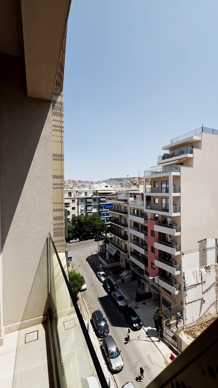 Urban City Street View from Apartment Balcony