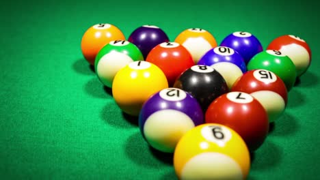 billiard balls on green baize