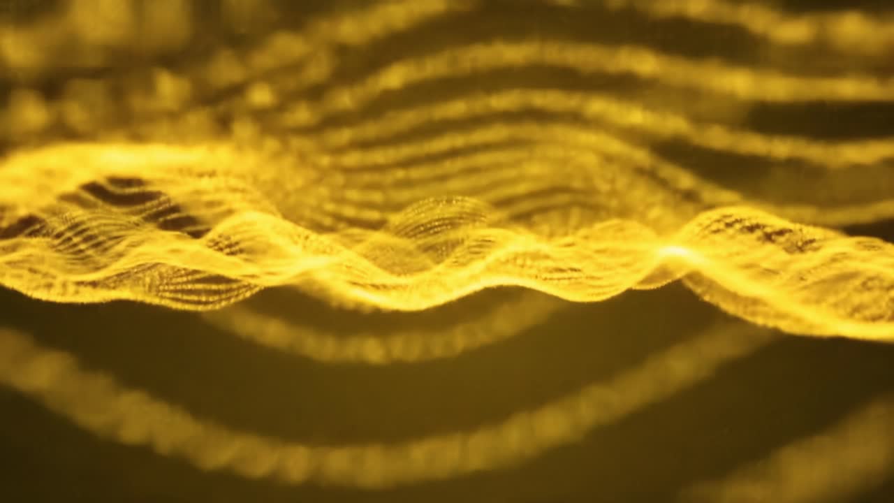 Intricate patterns and vibrant yellow hues depict sound waves, creating a mesmerizing visual experience in an art exhibit. Viewers are captivated by the flowing designs of this installation.
