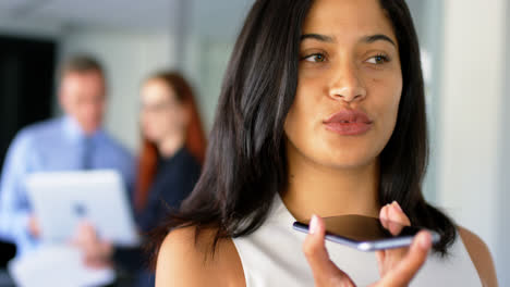 Businesswoman-talking-on-mobile-phone-4k