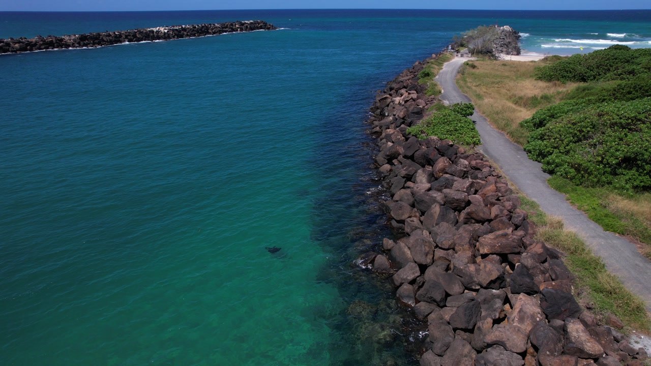 South Head Seawall Along Letitia Road In Fingal Head, New South Wales, Australia. Aerial Ascending Shot