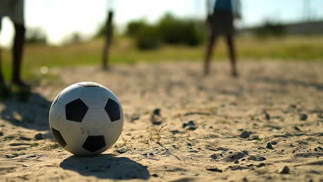 low section of boy kicking the football 4k