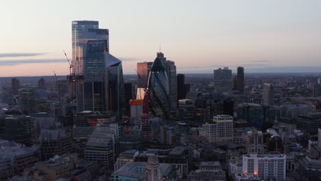 Iconic-skyscrapers-in-City-financial-and-business-centre.-Modern-buildings-against-twilight-sky.-London,-UK