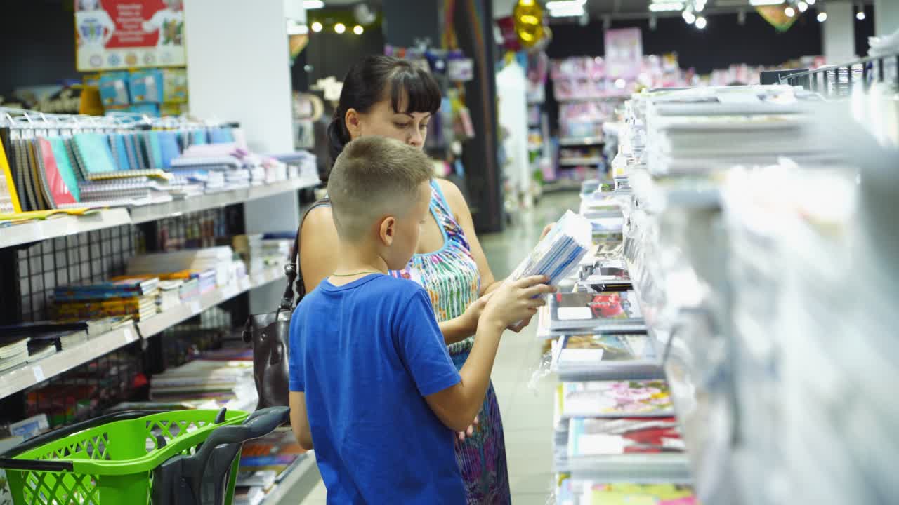 VINNITSA, UKRAINE - AUGUST 20, 2018: Back to school concept. Purchase of stationery in the store