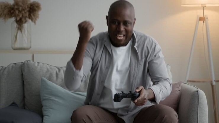 Man Playing Video Game on Couch