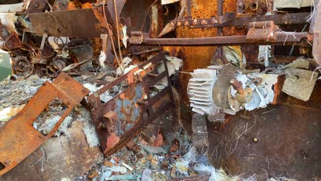 fully burned and destroyed inside of a war vehicle in mykhailivska square in kyiv ukraine, shelled car tank from russia ukraine war, broken windows and explosion damage, 4k shot