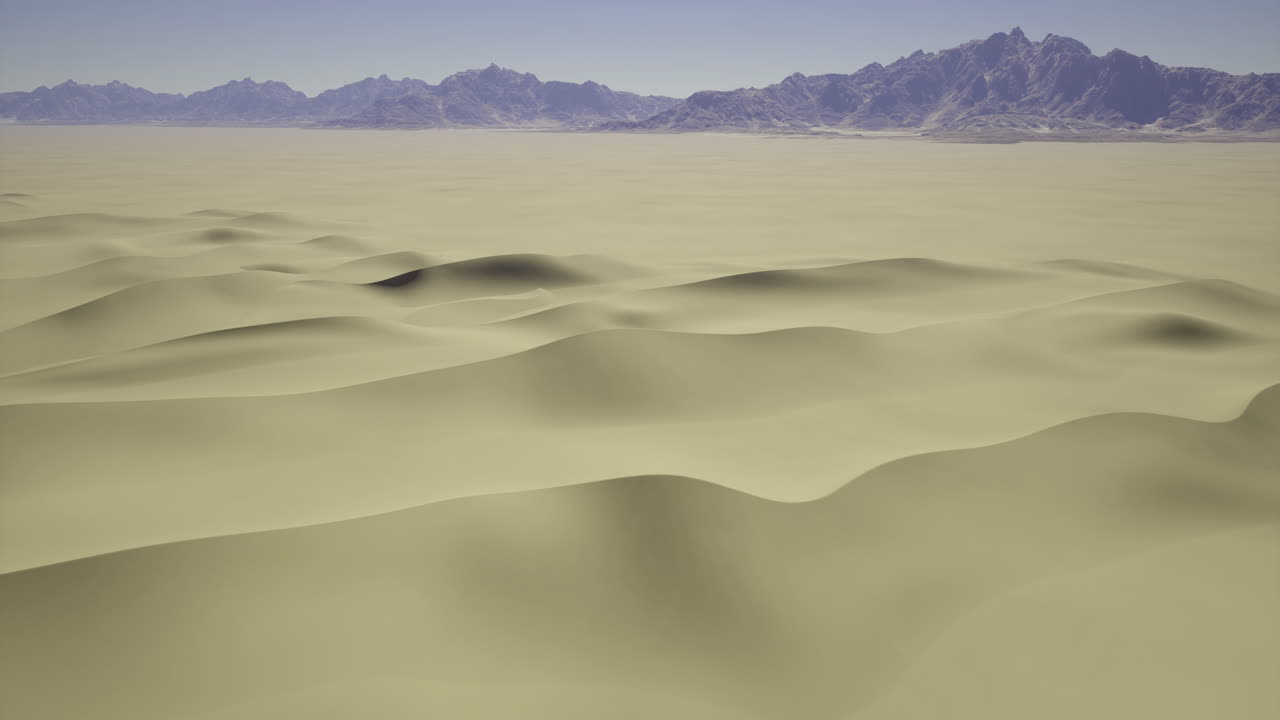 Vast desert landscape with gentle sand dunes and distant mountains