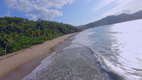 Drone-FPV-shot-Playa-Caleton-El-valle-sea-area-in-Samana,-Dominican-Republic