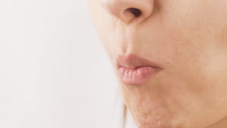 woman eating dried figs, close-up. dried fruits.