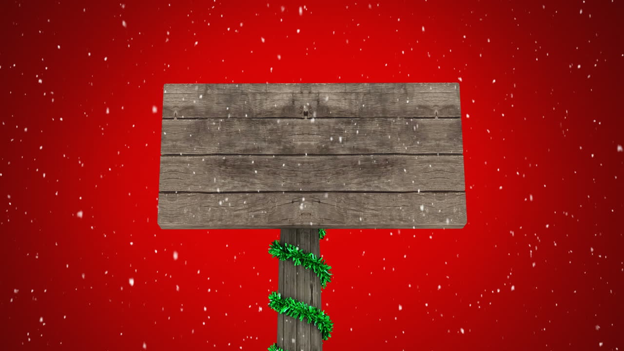 Papan Natal dan salju berjatuhan