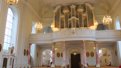 magnificent church interior with large pipe organ
