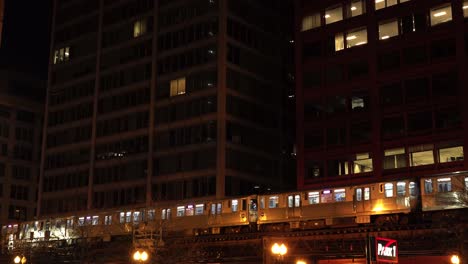 Two-City-Subway-Trains-Passing-Each-Other-At-Night