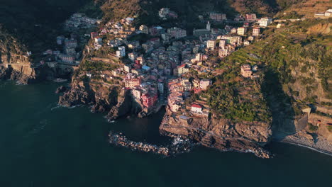 colorful coastal village of riomaggiore in cinque terre, italy, overlooking the sea