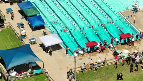 bird's-eye view of sporting event with people gathered from around the town