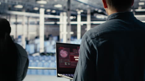 server hub programmer alerted by warning message on laptop about bugs