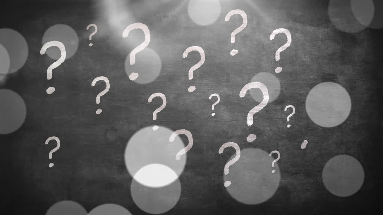 animación de signos de interrogación sobre puntos de luz en fondo gris.