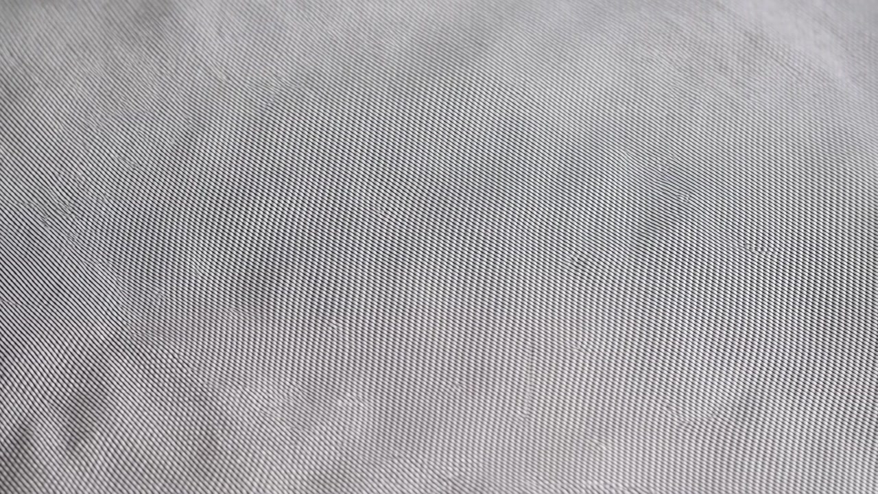 Closeup Gray Fabric Texture With Subtle Ribbing, Soft Light, Shallow Depth, Gently Worn Surface, Minimal