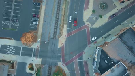 aerial tracking shot of car in downtown