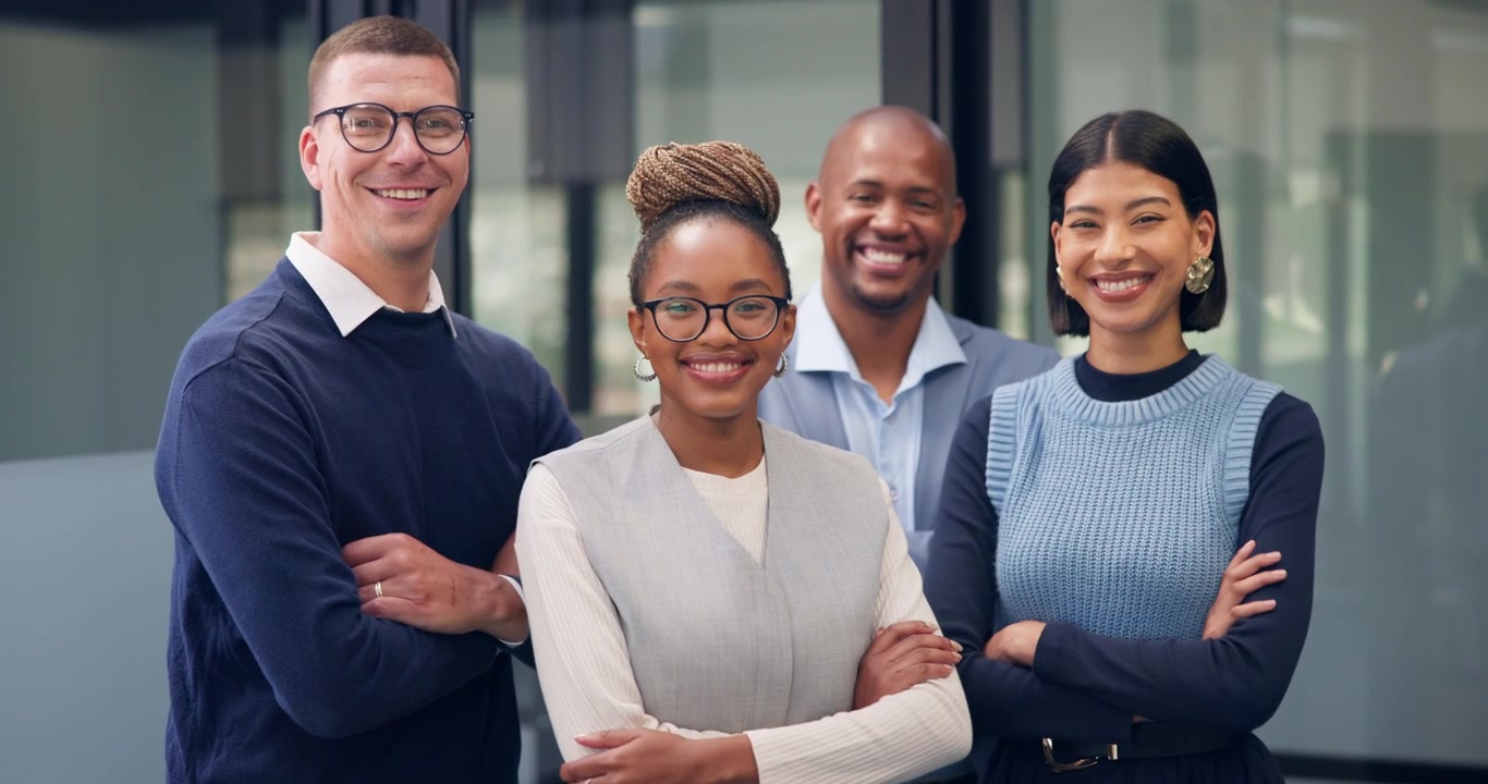 Diverse Group of Professional Colleagues Standing Together in Modern Office