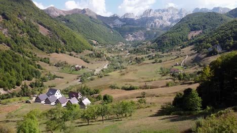 mountain landscape of lepushe valley, north albania - aerial forward