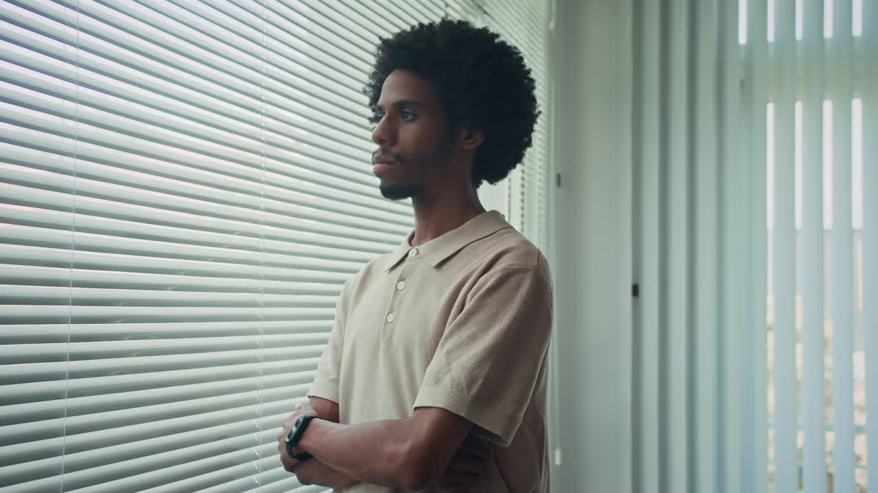 Portrait of Black Employee Posing for Camera at Office