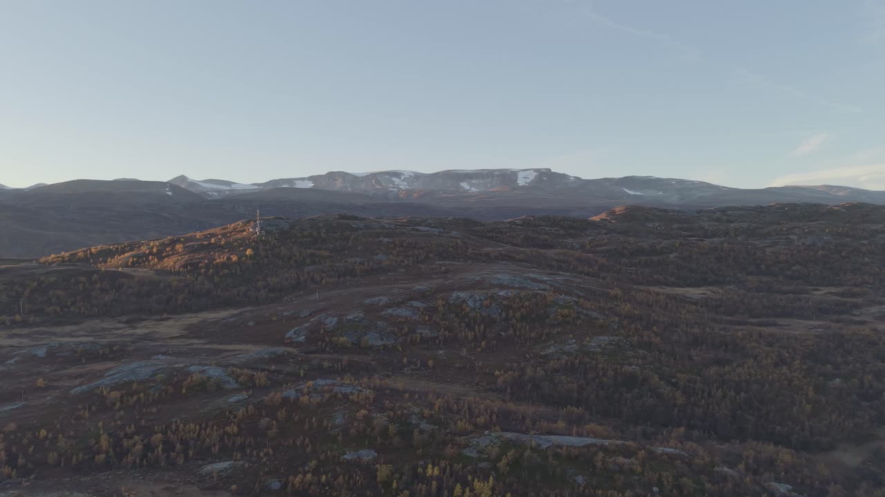 Beautiful autumn landscape in Jotunheimen National Park. Drone footage at sunset