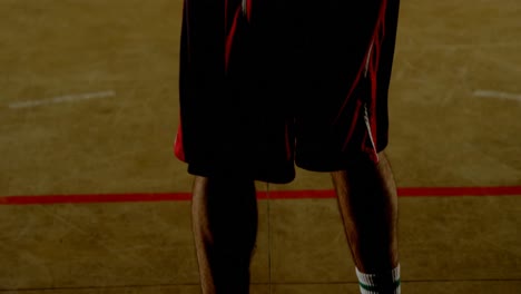 Male-basketball-player-playing-basketball-in-the-court-4k