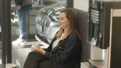 car service manager enjoying coffee break