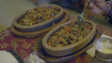 close-up of a delicious turkish meal with meat and vegetables in a ceramic dish