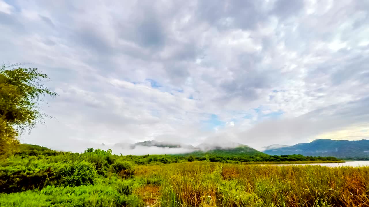 Timelapse video of cloud and fog moving through over the mountain