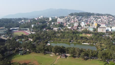 cityscape view of baguio, burnham park, melvin jones and athletic bowl, philippines