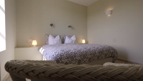 slow rising shot of a minimal spare bedroom within a villa in tresques in france