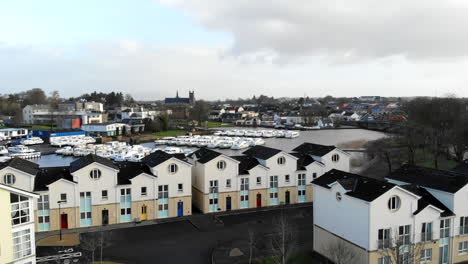 Aerial---Over-the-houses-fly-towards-to-jetty