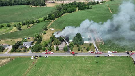 burning farm house in rural area of american state in hot summer season