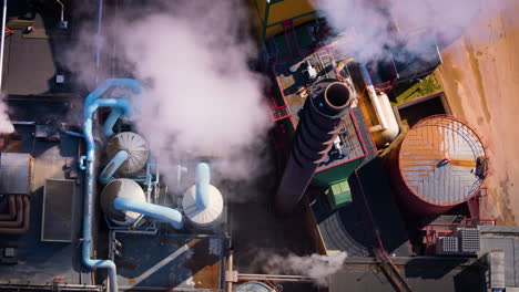 hazardous gases emitted from industrial power plant, top aerial view