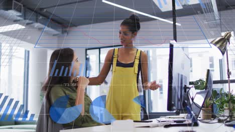 Animation-of-multiple-graphs,-changing-number,-loading-circles,-female-coworkers-discussing-on-desk