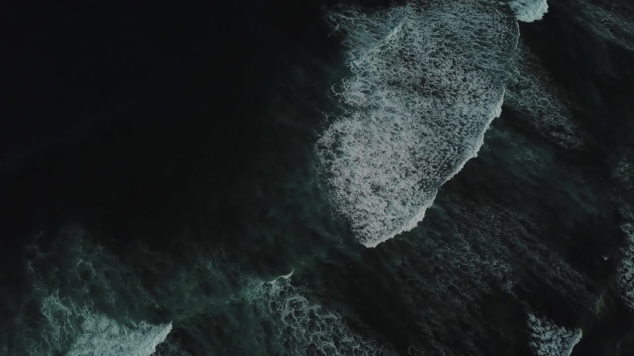 Waves on Oahu, HI at sunset off of Diamond Head