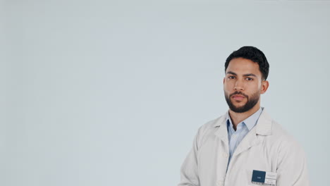 pointing, hand and medical doctor man in studio