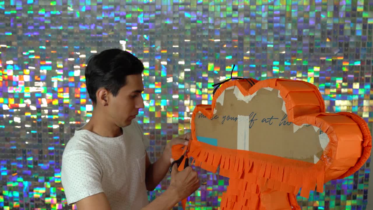 Crafting Disney Pixar’s Inside Out 2 Anxiety Emotion Pinata with Orange Fringe Paper