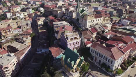 aerial overhead view of hotel brighton and valparaiso lutheran church on bright sunny day in valparaiso , chile